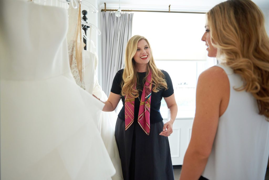 On today’s show, Julie continues the dress shopping conversation she had during the first 3 episodes. The anticipation of seeing your actual wedding dress for the first time can be overwhelming. You may wonder if you will still love it, if it will still fit properly, or even if they made the changes you requested. Julie has been to hundreds of dress fittings and today she tells you exactly what to expect, gives you some expert tips on how to make your first fitting go smoothly, and hopefully will alleviate any anxiety you may have.