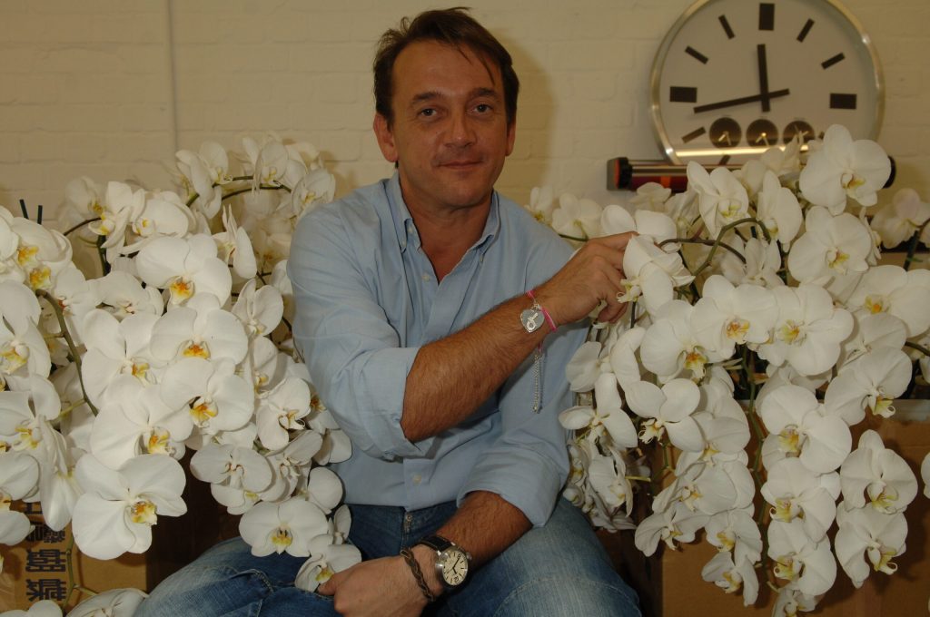Rob is the owner of Rob Van Helden Floral Design Limited out of London. His previous clientele include Nelson Mandela, Joe Malone, Elton John, the Beckham’s World Cup party, Alfred Dunhill and James Bond film premiers, and Royal weddings and events including Princess Beatrice, Princess Eugenie, and Princess Margaret’s 70th birthday among others.